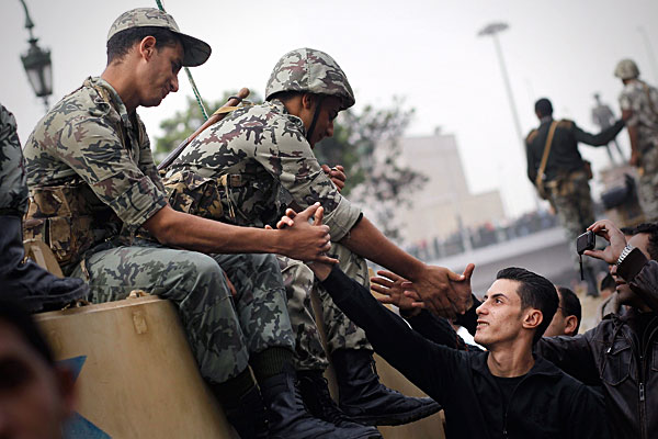 marchers_shake_hands_witharmy.jpg