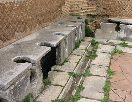 Roman_Public_Toilets_Ostia.jpg